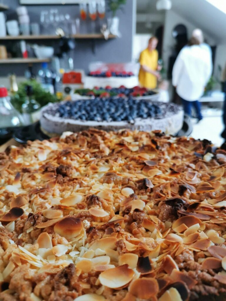 How to Support Local Communities in Dubrovnik โ Travel Guide to Dubrovnik 71 a large pizza sitting on top of a wooden cutting board