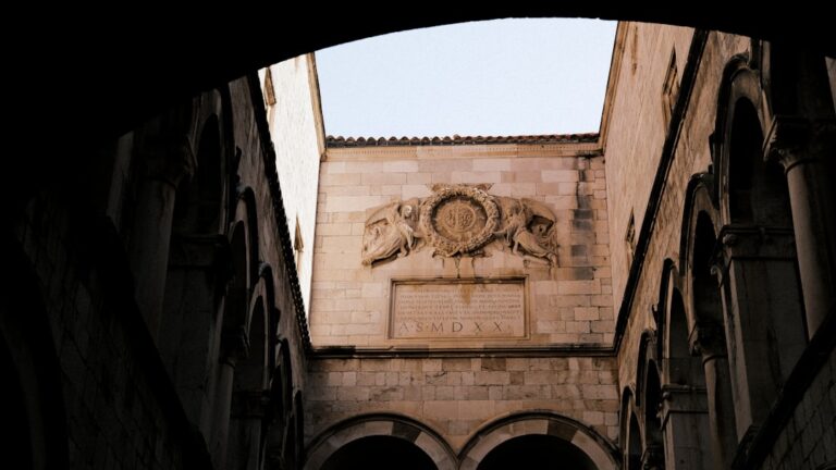 a view of a building through an archway