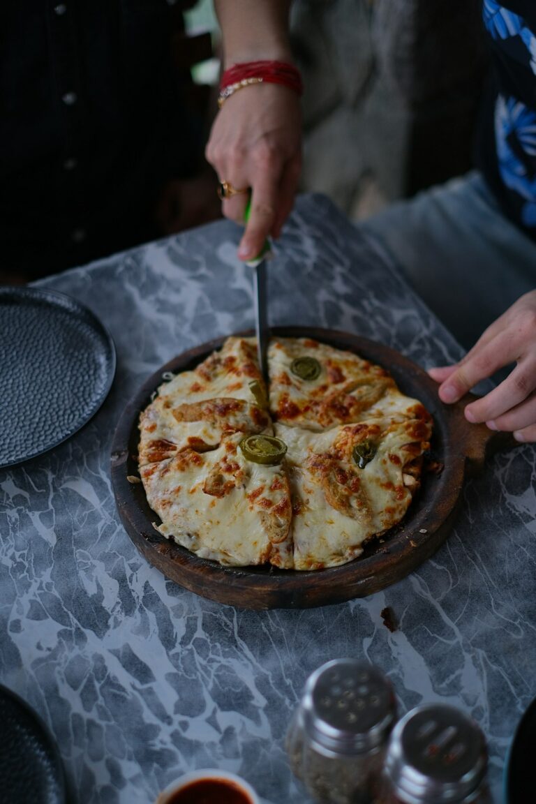 Best Sustainable Travel Itinerary in Dubrovnik β Travel Guide to Dubrovnik 50 having pizza at, Lal Tibba Scenic Point