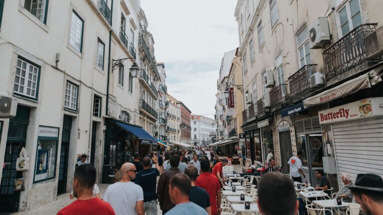 Zero-Waste Dining & Shopping in Dubrovnik โ Travel Guide to Dubrovnik 1 a group of people walking in a city