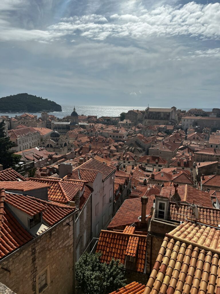 What to Wear in Dubrovnik: Dress Code & Local Fashion Tips โ Travel Guide to Dubrovnik 105 a view of a city from a high point of view
